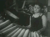 A girl working in a Soviet factory