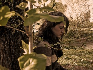 just-breathe-girl-leaning-against-tree