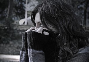 just-breathe-girl-with-sweater-over-face-black-white